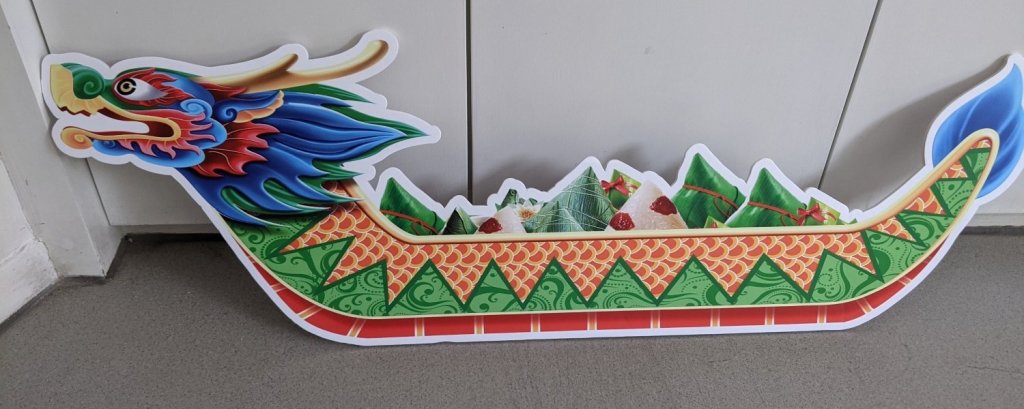 Cardboard dragon boat with zhongzi